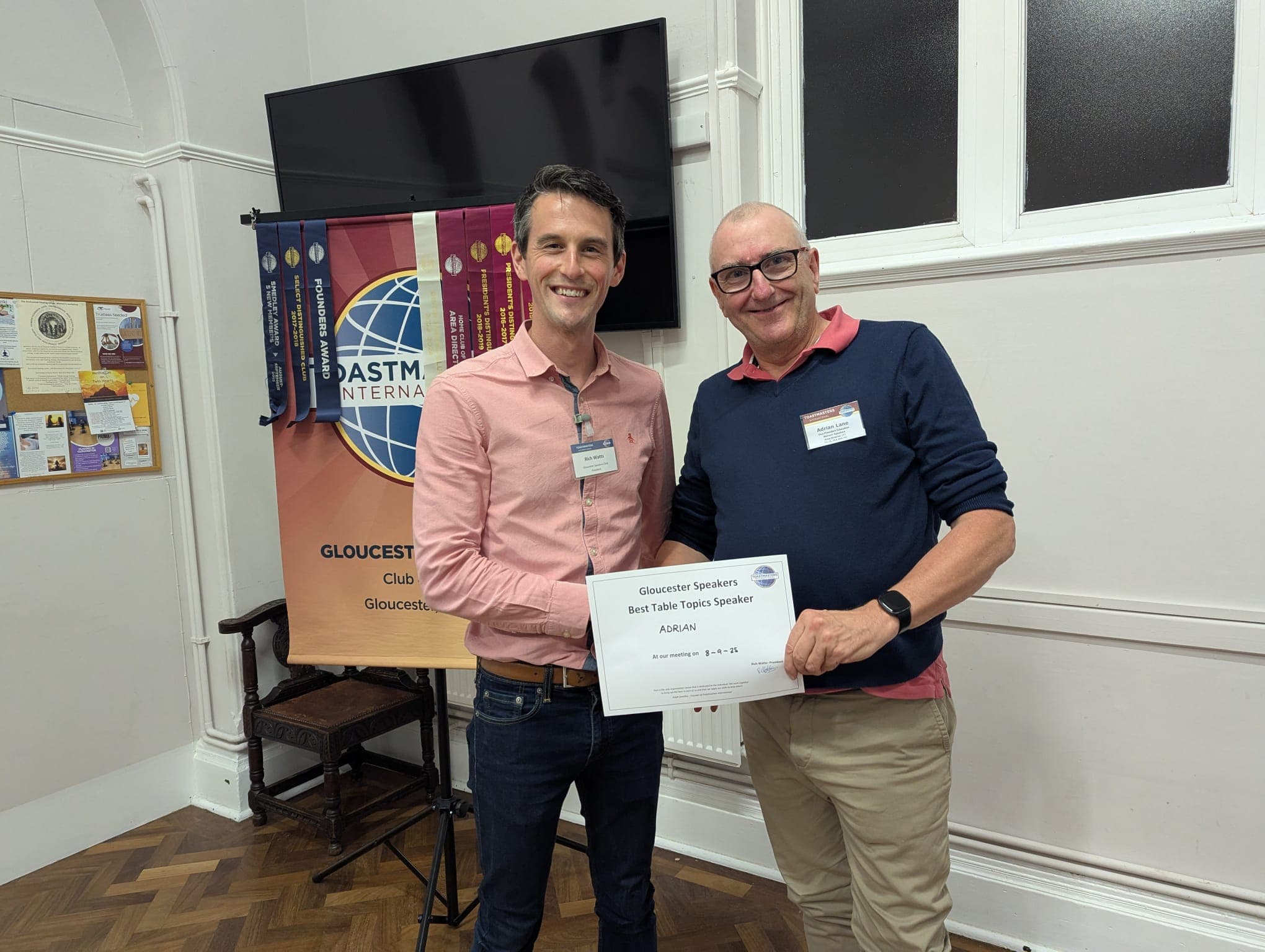 Community members at club meeting